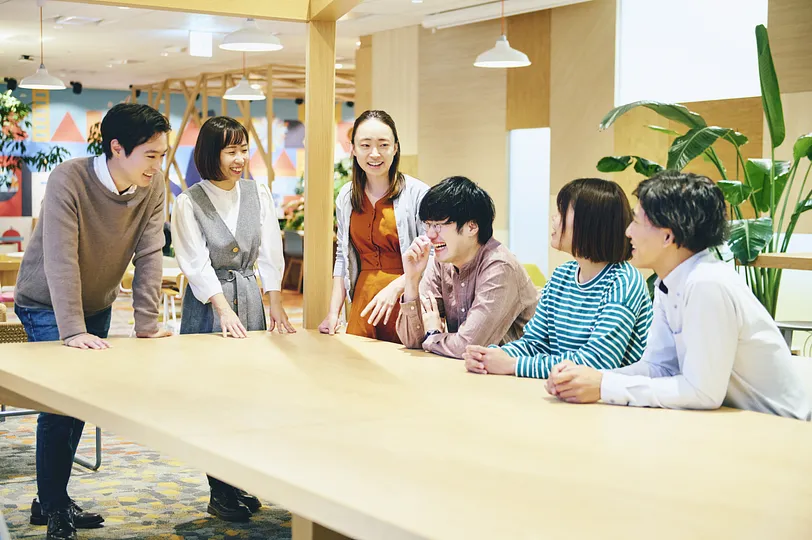 Smiling and laughing people at a table