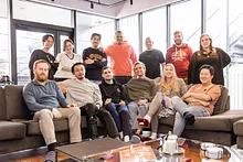 The team posing for a photo