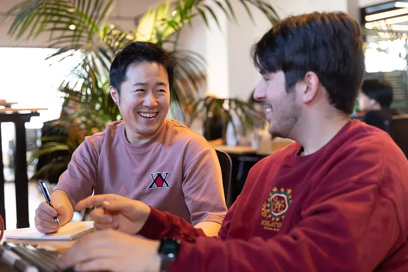 Two smiling people