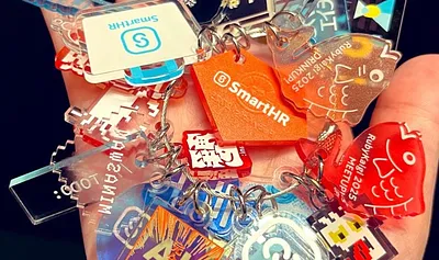 Collection of SmartHR acrylic charms